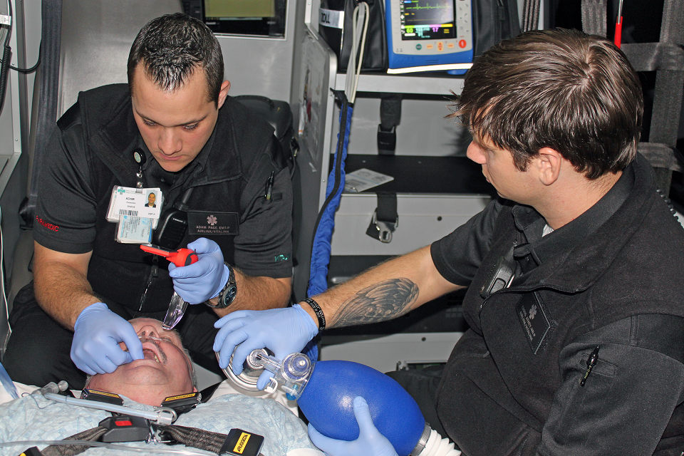 Paramedics intubating